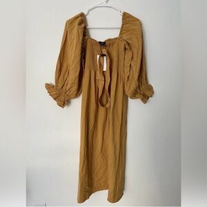 Smocked Puff-Sleeve Midi Dress in Mustard